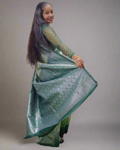 Handloom Green Silk Saree with Floral Motifs  Product Description: