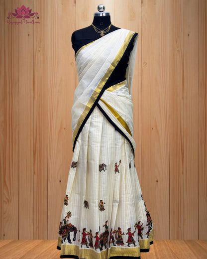 black and gold Dhawani set featuring a majestic elephant design.